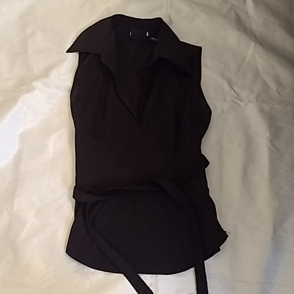 Sleeveless black collared top